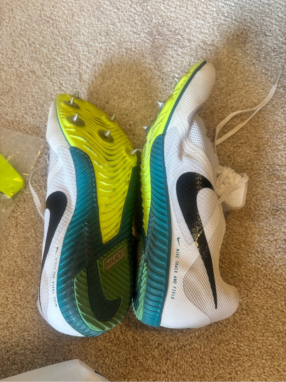 Nike gender neutral White, Neon Green & Teal Track Spikes